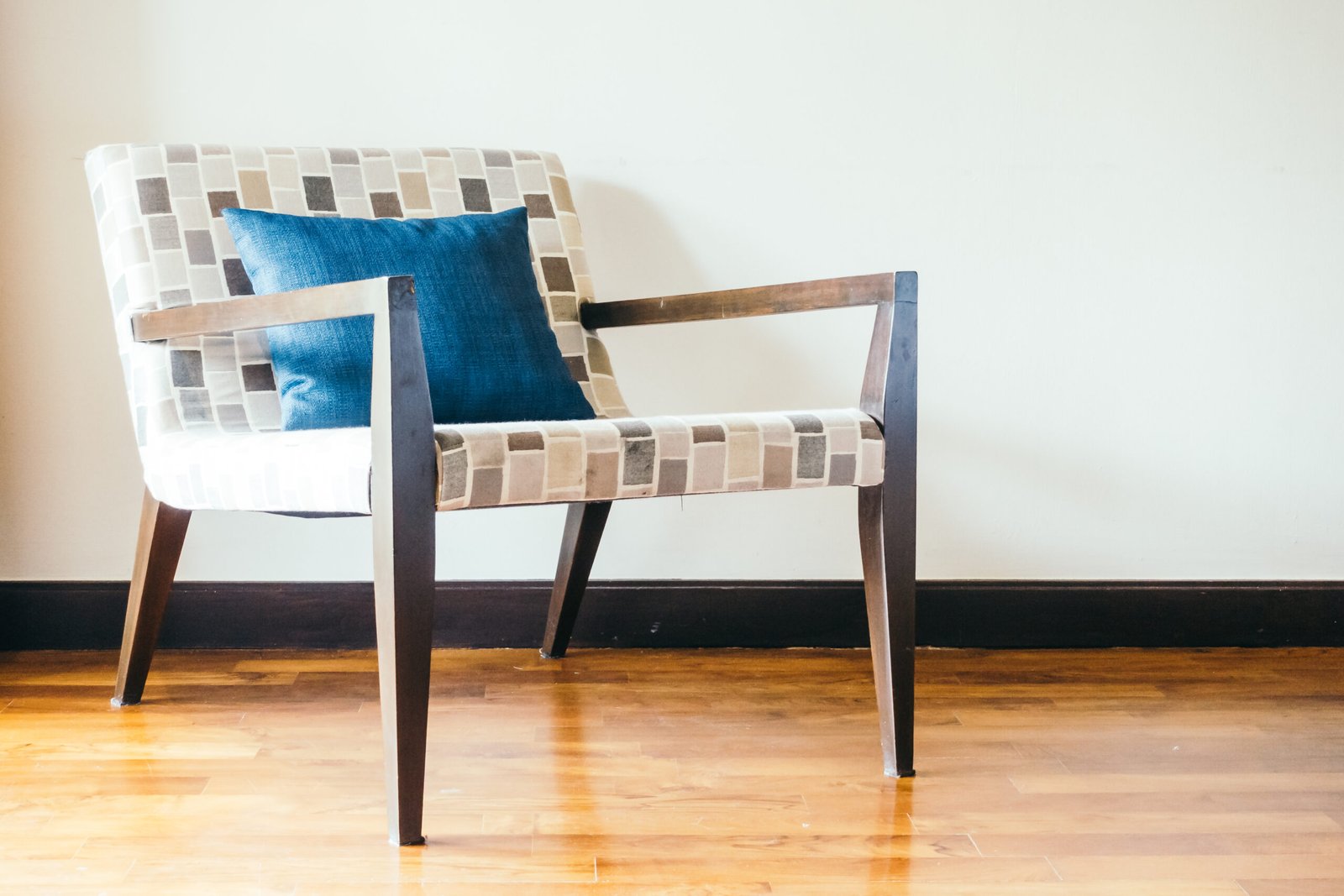 Empty wooden chair with pillow decoration in living room interior - Vintage Filter